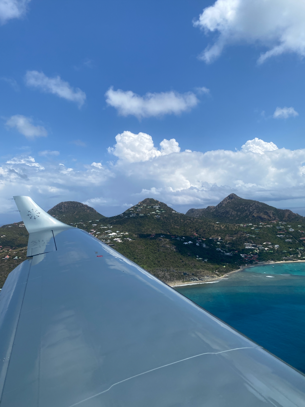 a view of the island sky from the small plane