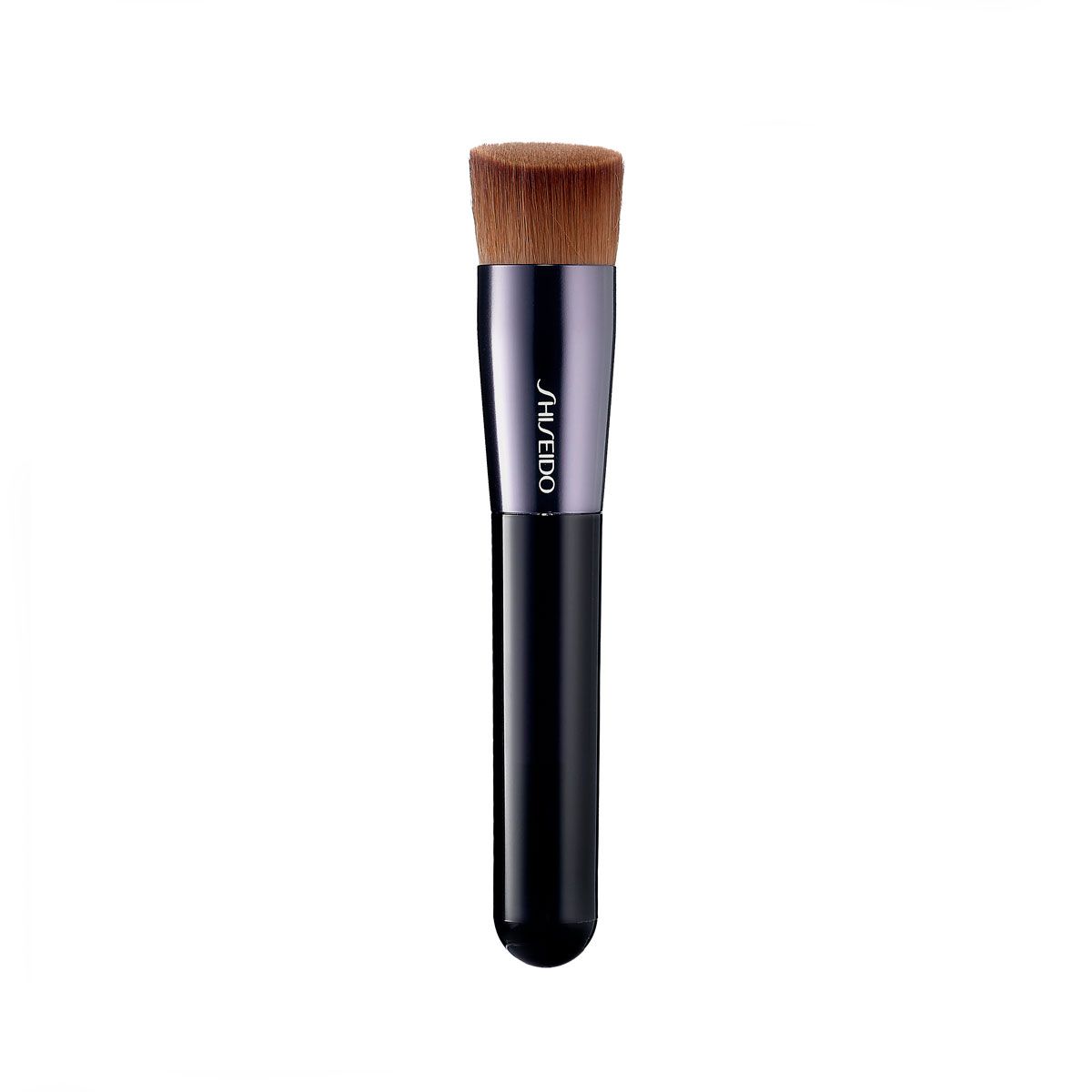 applying liquid foundation with a brush