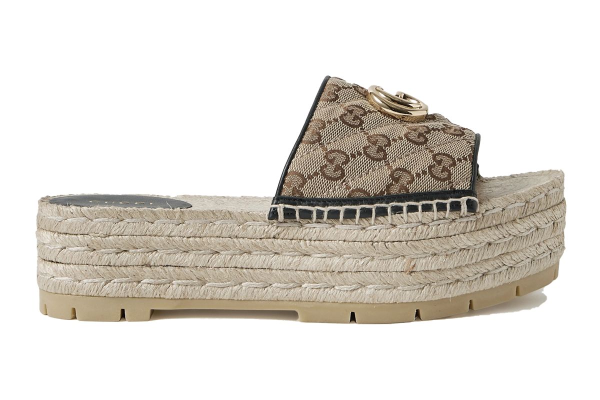 gucci pilar logo embellished leather trimmed quilted logo print canvas slides