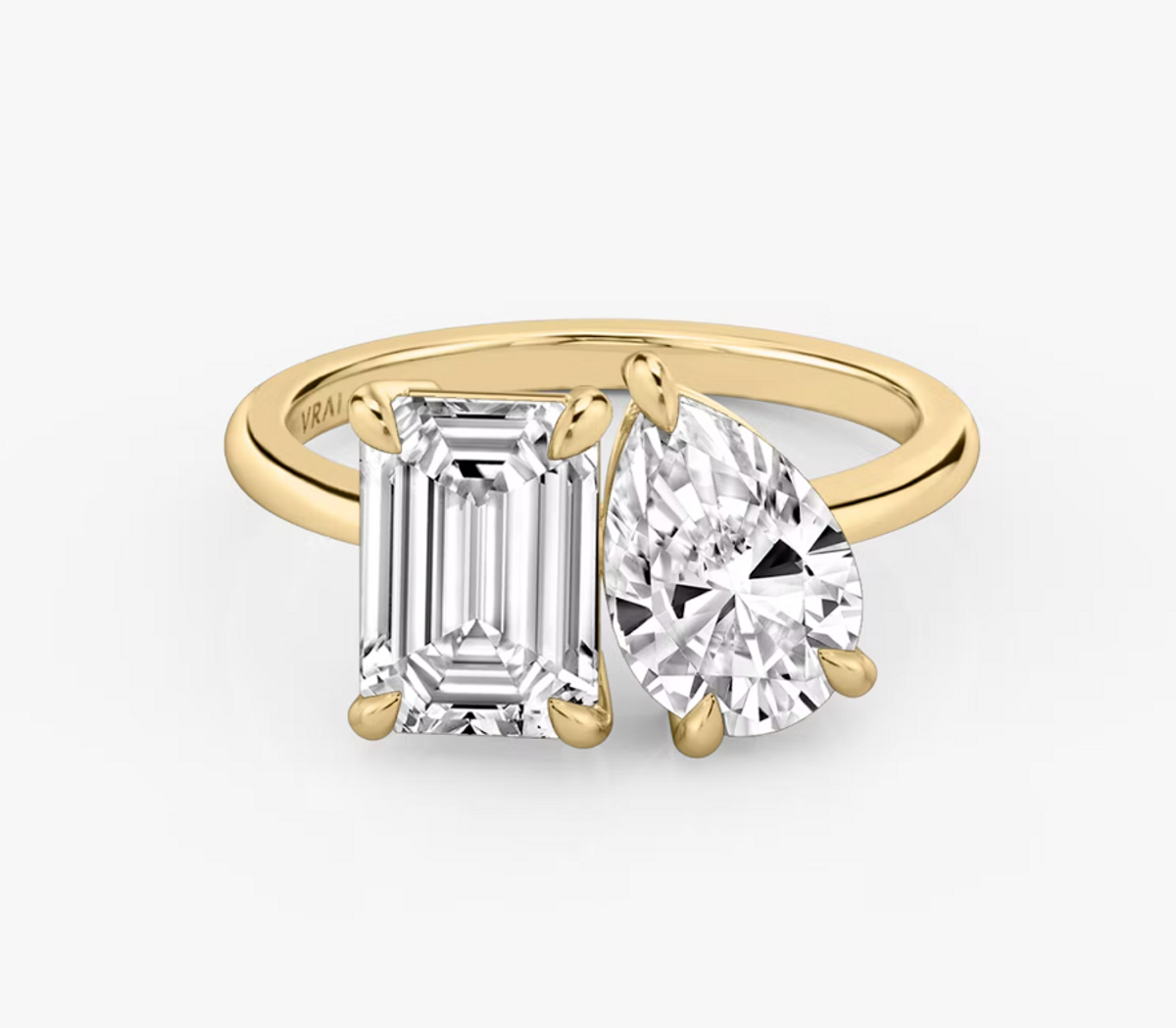 The Toi et Moi Emerald and Pear Engagement Ring