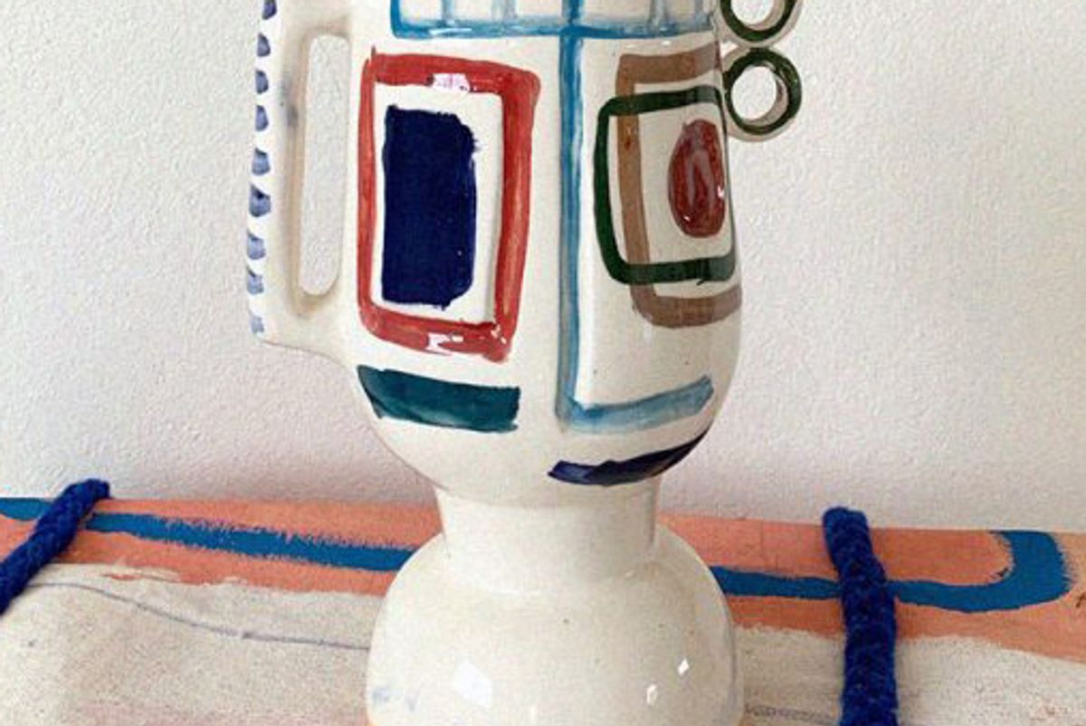 lrnce carved visage vase 10