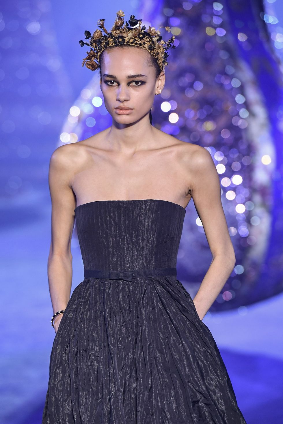 model on the runway at Dior's FW 23 show