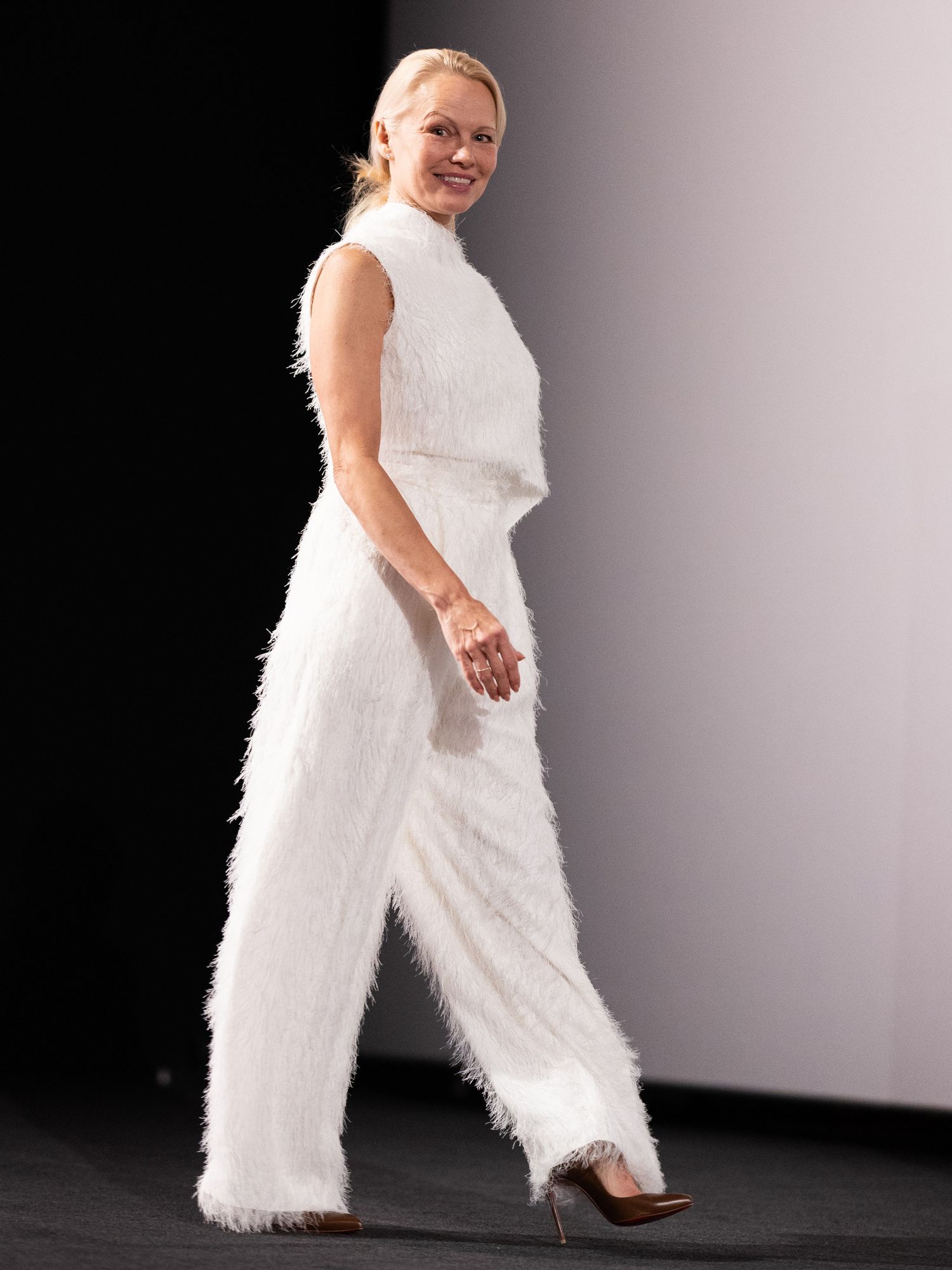 Pamela Anderson style white suit