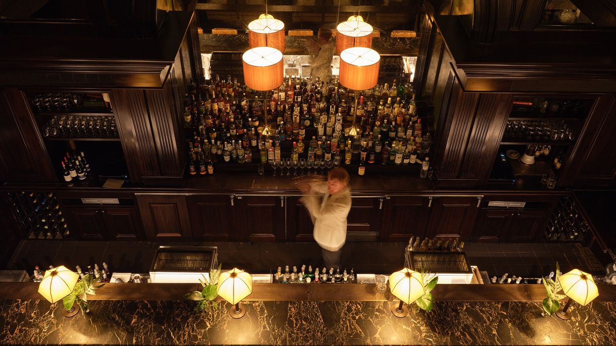 Photo of Bartender Behind The Bar Located in The Ned Nomad