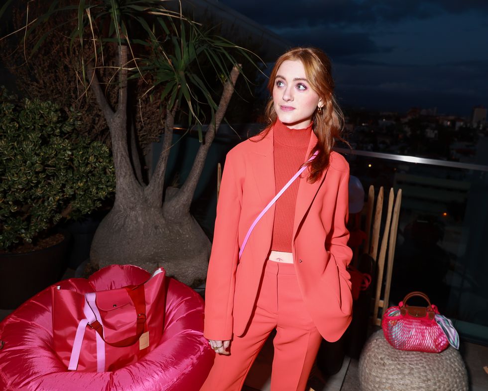 Photo of Natalia Dyer in Orange Suit
