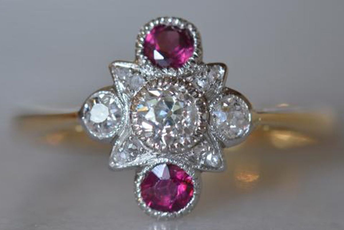 st eloi standout geometric deco diamond and ruby ring