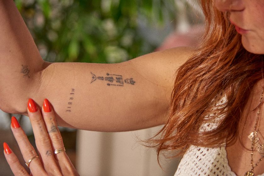 the tattoos on the inside of rosa perr's right arm