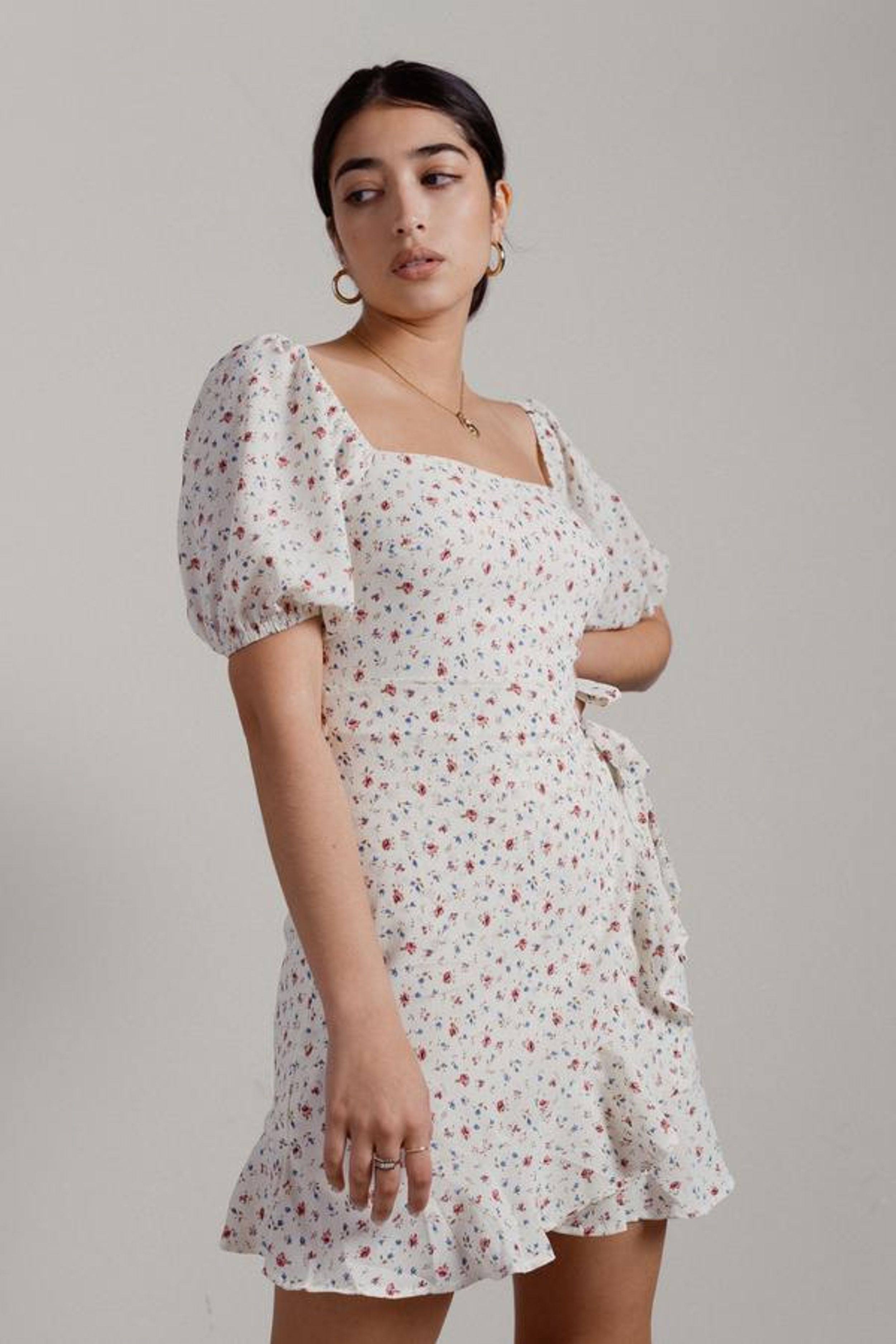 tobi frolicking floral puff sleeve wrap dress in ivory