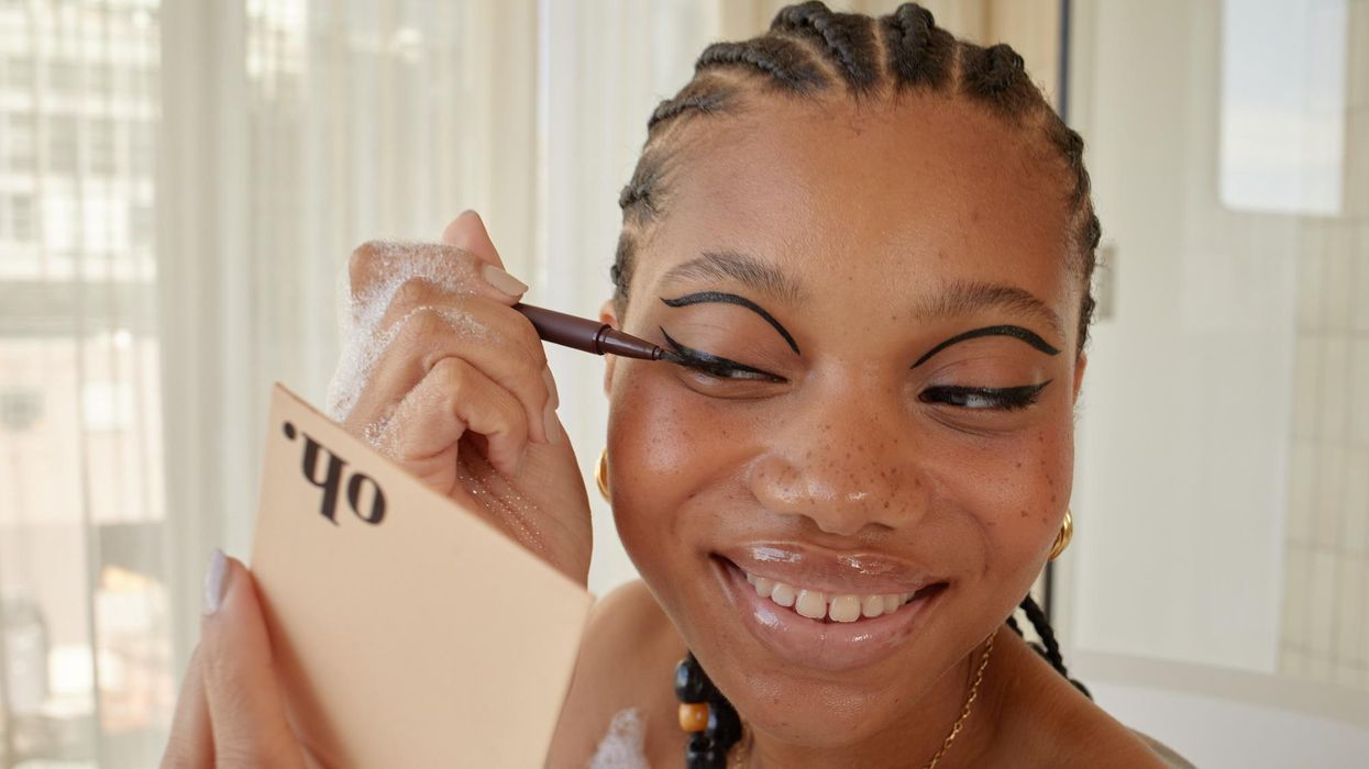 woman doing makeup